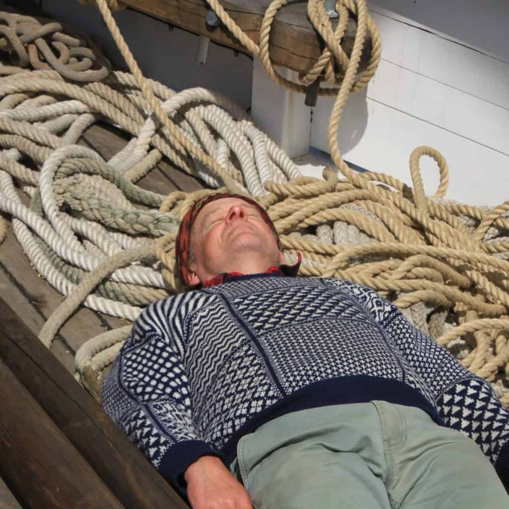 Adam taking a relaxed approached to coiling ropes.jpg