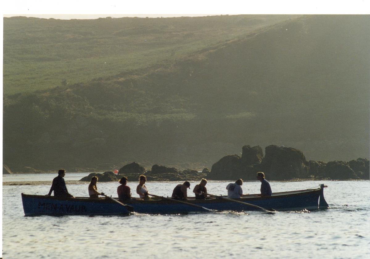 Gig boat girls rowing in New Grimsby Sound, Isles of Scilly
