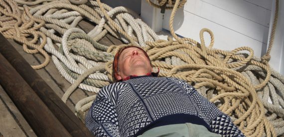 Adam taking a relaxed approached to coiling ropes.jpg