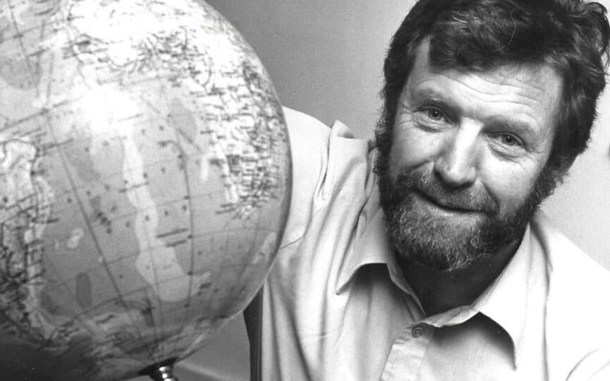 The late author and Explorer Kit Mayers with a globe. You can buy his book to help raise funds for Greenpeace.