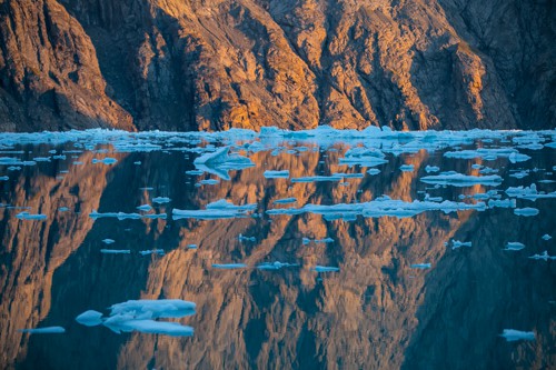 Precipitous rocks and floating sea ice along the shores of Svalbard