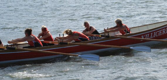 Debbie the skipper of Tallulah is rowing in No 1 seat, in the bows of Killigerran one of the roseland Gig Clubs boats