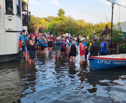 The White Swan, Twickenham with the tide at its door for the Great River Race meeting point for finished Cornish Pilot Gig Boats.